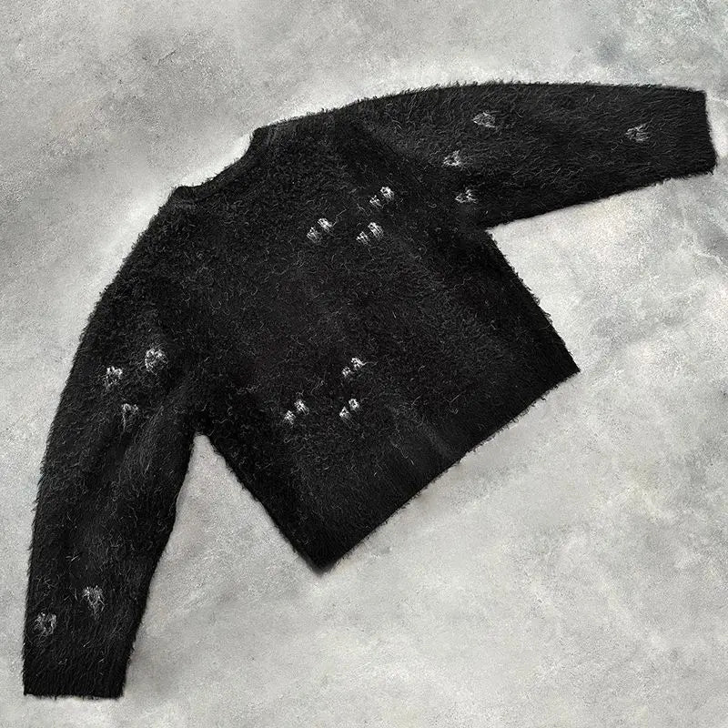 Women's V-neck knit cardigan sweater.